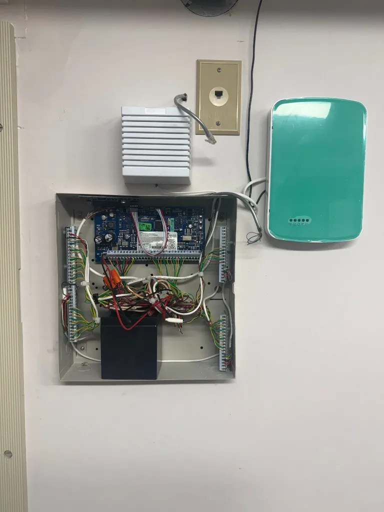 DSC Neo security alarm control panel and Alarm.com cellular communicator - Security Installation by AK Security Ltd. Vancouver
